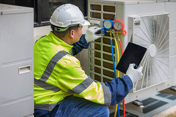 Professional Hvac technician working in Reading, MA